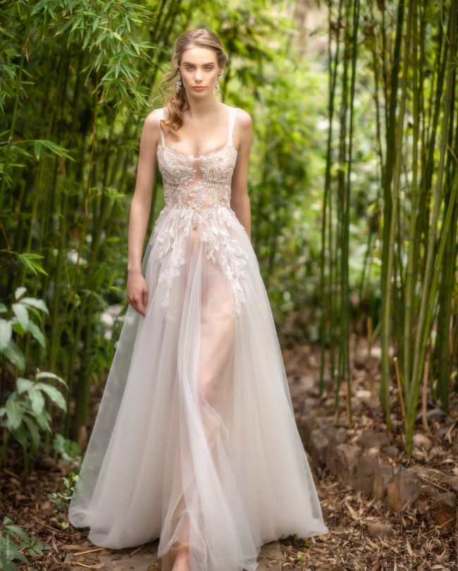 ethereal wedding dress woman in marsh