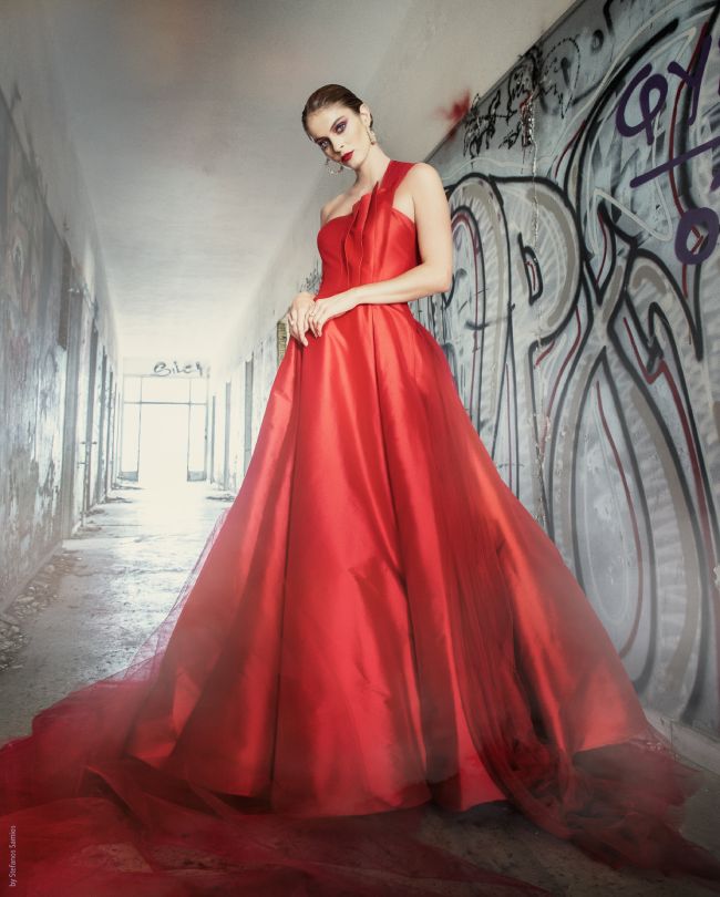 oscar red dress in abandoned corridor